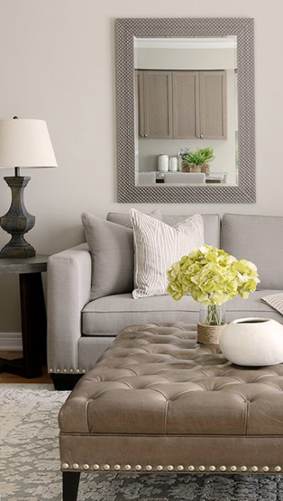 sofa and ottoman in living room interior