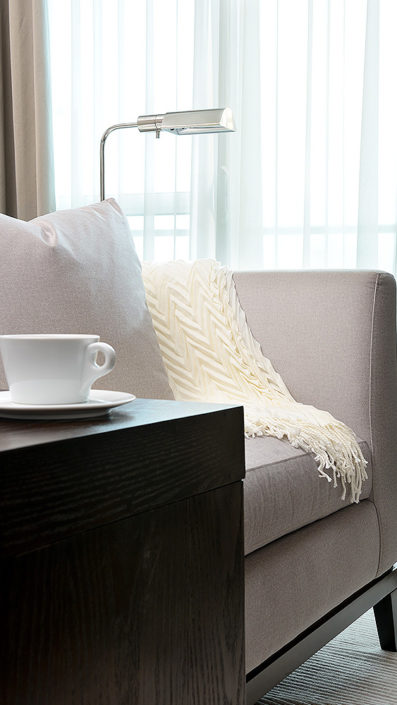 Cappuccino on side table in living room