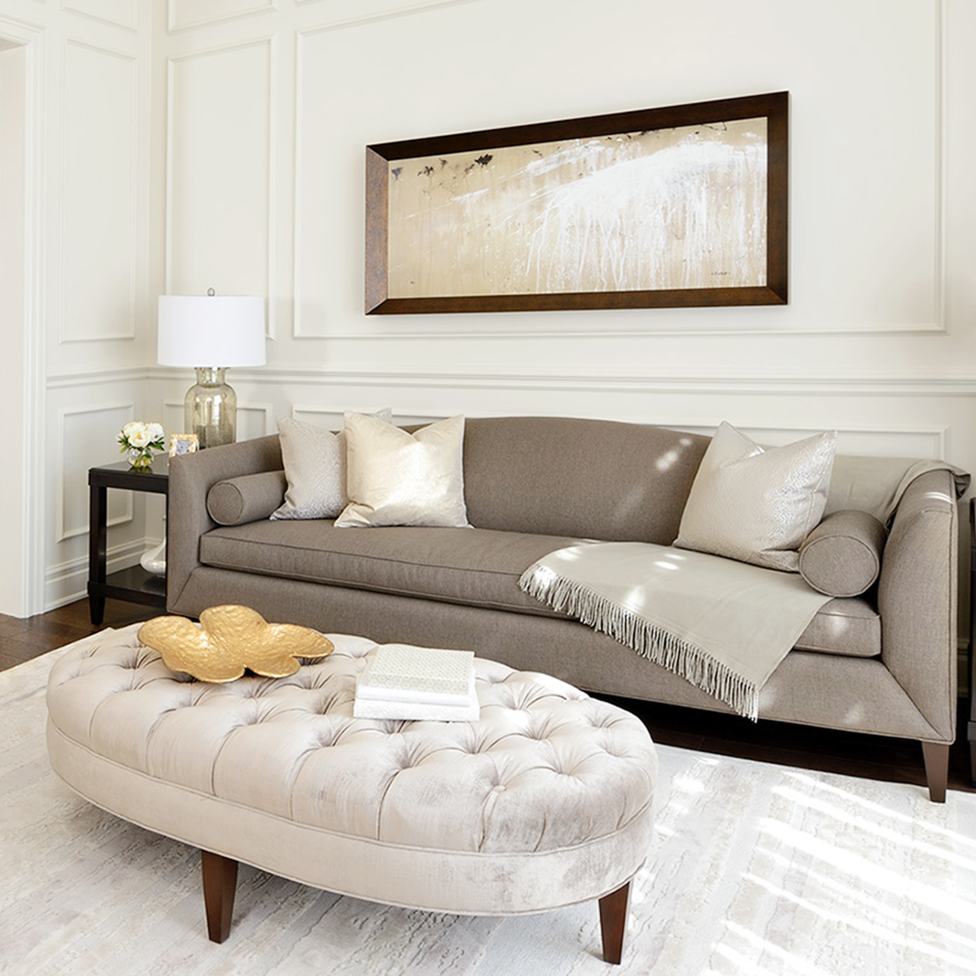 well-travelled-tm light brown couch and velvet tufted ottoman
