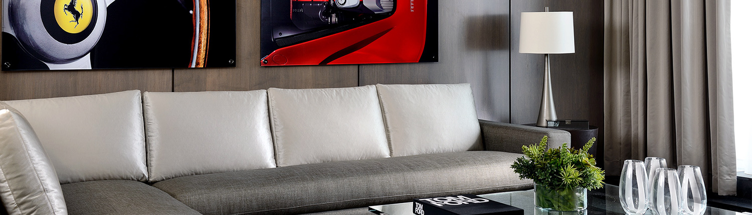sleek modern living room with vibrant ferrari artwork on the wall